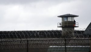 Guard Station State Penitentiary Barbed Wire Grey Sky Fence