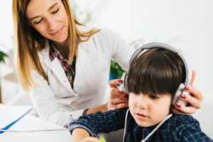 Hearing Test for Children - Little Boy Doing a Audiometry Test