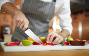 Chef Cutting Vegetables Closeup