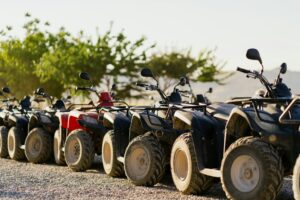 ATV Quad Bikes in row outdoors
